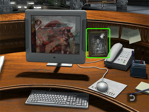 There is a picture of Victoria on Richard's desk. Take it.